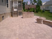 Concrete Paver Patio with sitting wall and grilling area